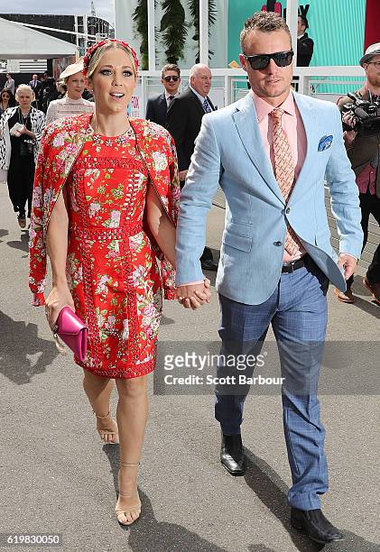 Bec Hewitt and Lleyton Hewitt arrive at the Lavazza Marquee on Melbourne Cup Day at Flemington Racecourse on November 1, 2016 in Melbourne, Australia.