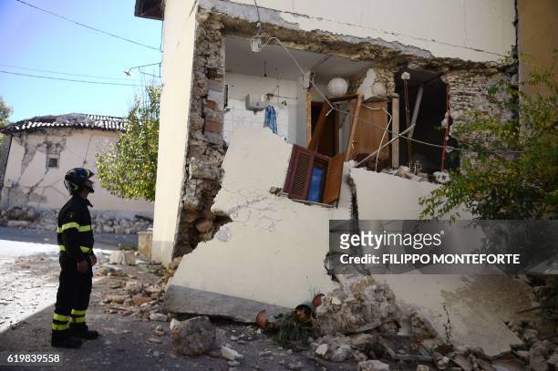 Fireman looks destroyed houses in the village of San Pellegrino near Norcia, on November 1 two days after a 6.5 magnitude earthquake hit central...
