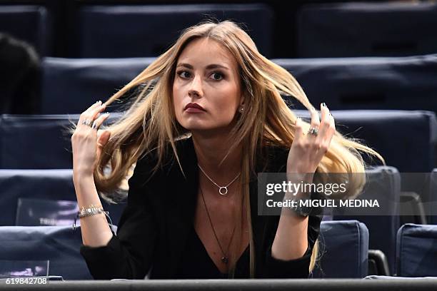 Czech model and wife of Czech Republic's Tomas Berdych Ester Satorova attends his second round tennis match against Portugal's Joao Sousa at the ATP...