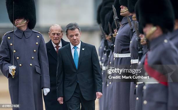 Prince Philip, Duke of Edinburgh with President Juan Manuel Santos Calderon attending the Official Ceremonial Welcome for the Colombian State Visit...