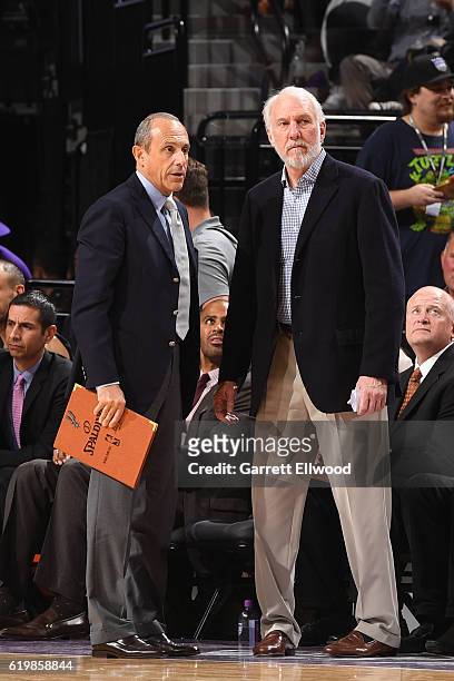 Gregg Popovich and Ettore Messina of the San Antonio Spurs coach together during the game against the Sacramento Kings on October 27, 2016 at the...