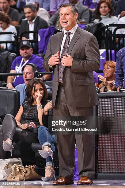 David Joerger of the Sacramento Kings smiles and coaches during the game against the San Antonio Spurs on October 27, 2016 at the Golden 1 Center in...