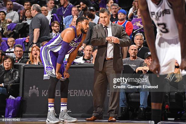 David Joerger coaches Garrett Temple of the Sacramento Kings during the game against the San Antonio Spurs on October 27, 2016 at the Golden 1 Center...