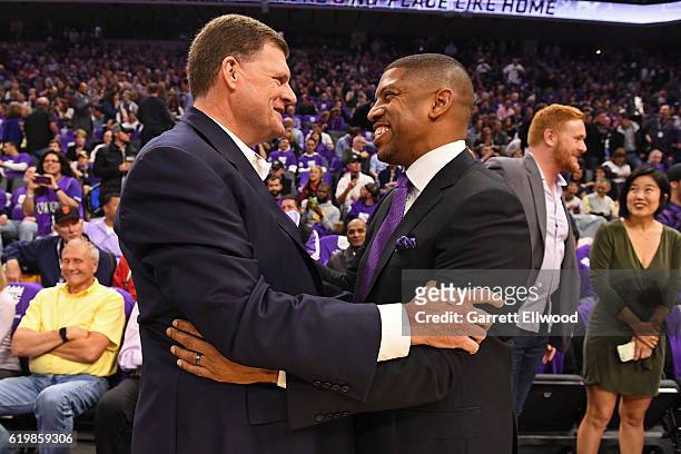 Mayor of Sacramento, Kevin Johnson greets Clay Bennett, Owner of the Oklahoma City Thunder, before the game the San Antonio Spurs game against the...