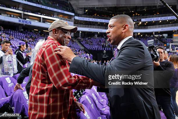 Dusty Baker manager for the Washington Nationals greets Sacramento mayor Kevin Johnson prior to the game between the San Antonio Spurs and Sacramento...