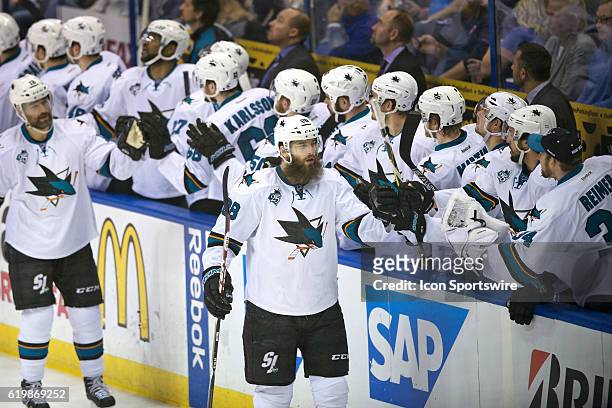 San Jose Sharks defenseman Brent Burns is congratulated by teammates after is goal in the 3rd period against the St. Louis Blues during game two of...