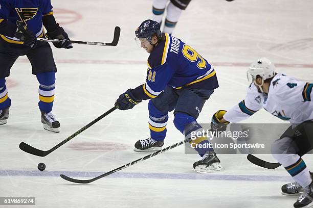 St. Louis Blues right wing Vladimir Tarasenko and San Jose Sharks defenseman Brenden Dillon battle for the puck during game two of the Western...