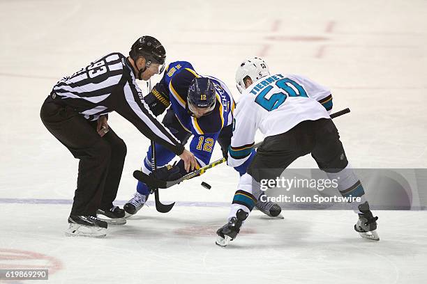 St. Louis Blues center Jori Lehtera and San Jose Sharks center Chris Tierney face off center ice during game two of the Western Conference Final of...