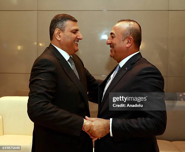 Turkish Foreign Minister Mevlut Cavusoglu meets with Riyad Hijab, the General Coordinator of the Syrian High Negotiations Committee, in Doha, Qatar...