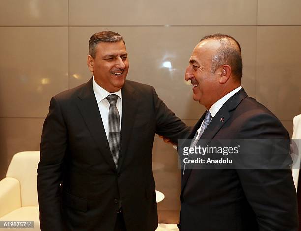 Turkish Foreign Minister Mevlut Cavusoglu meets with Riyad Hijab, the General Coordinator of the Syrian High Negotiations Committee, in Doha, Qatar...