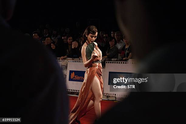 Vietnamese actress Angela Phuong Trinh arrives at The Hanoi International Film Festival in Hanoi on November 1, 2016. Vietnam's glitterati donned...