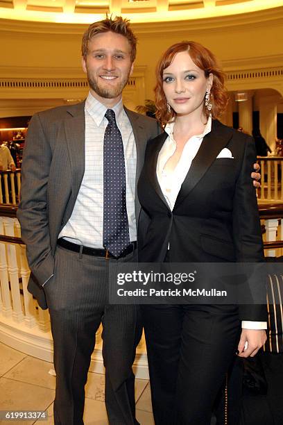 Aaron Staton and Christina Hendricks attend Brooks Brothers Mad Men at Brooks Brothers on October 20, 2008 in Beverly Hills, CA.