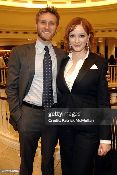 Aaron Staton and Christina Hendricks attend Brooks Brothers Mad Men at Brooks Brothers on October 20, 2008 in Beverly Hills, CA.
