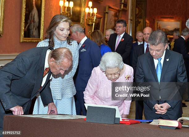 Queen Elizabeth II , Prince Philip, Duke of Edinburgh with Colombia's president Juan Manuel Santos and his wife, Maria Clemencia Rodriguez de Santos...