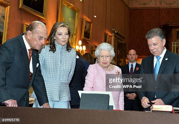 Queen Elizabeth II , Prince Philip, Duke of Edinburgh with Colombia's president Juan Manuel Santos and his wife, Maria Clemencia Rodriguez de Santos...