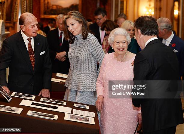 Queen Elizabeth II , Prince Philip, Duke of Edinburgh with Colombia's president Juan Manuel Santos and his wife, Maria Clemencia Rodriguez de Santos...