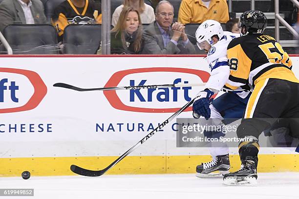 Pittsburgh Penguins defenseman Kris Letang checks Tampa Bay Lightning center Alex Killorn during the third period. The Tampa Bay Lightning won 3-1 in...