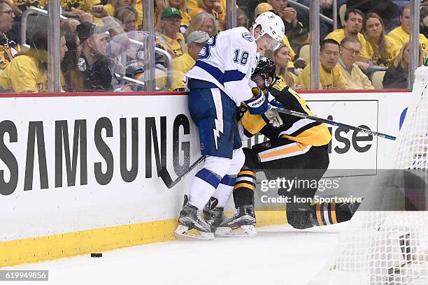 Tampa Bay Lightning left wing Ondrej Palat takes a boarding penatly on Pittsburgh Penguins defenseman Brian Dumoulin during the third period. The...