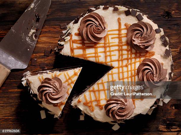 triple layer chocolate caramel cake - chocolate caramel stock pictures, royalty-free photos & images