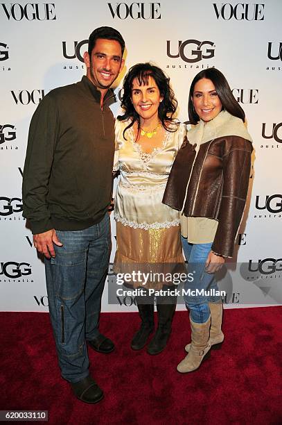 Jorge Posada, Connie Rishwain and Laura Posada attend UGG Australia Grand Opening hosted by VOGUE at UGG Upper West Side NYC on December 4, 2008.