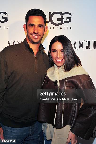 Jorge Posada and Laura Posada attend UGG Australia Grand Opening hosted by VOGUE at UGG Upper West Side NYC on December 4, 2008.