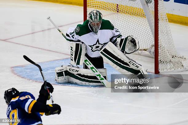 Dallas Stars goalie Kari Lehtonen makes a glove save on a shot by St. Louis Blues left wing Alexander Steen during the third period of a NHL Western...