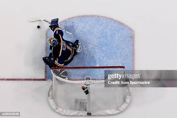 St. Louis Blues goalie Brian Elliott makes a save during a NHL Western Conference Round 2 - Game 3 Stanley Cup Playoff matchup between the Dallas...