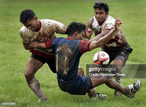 MUMBAI, INDIAPLAYERS FROM ARMY A AND ARMY B FIGHTING TO GRAB THE BALL DURING THEIR CLASH IN THE ALL-INDIA AND SOUTH ASIA RUGBY TOURNAMENT AT BOMBAY...