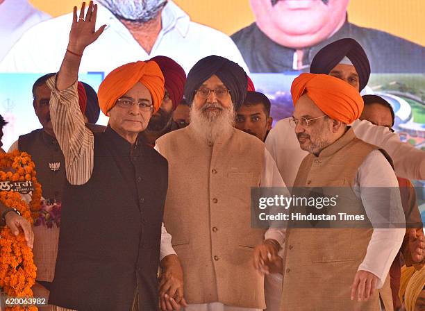 Union Finance Minister Arun Jaitley, Punjab CM Parkash Singh Badal and Bharatiya Janata Party National President Amit Shah during the 50th year of...