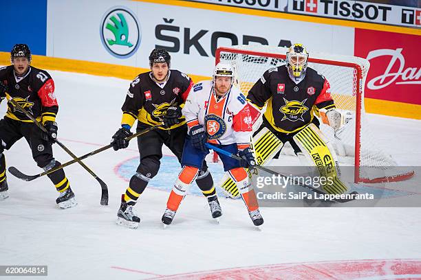 Valtteri Virkkunen, Brett Carson and Jussi Markkanen of Lappeenranta and Erik Josefsson of Vaxjo during the Champions Hockey League Round of 16 match...