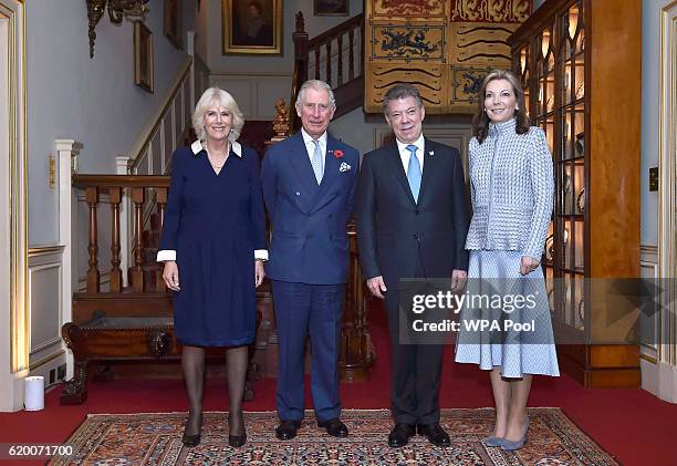 Colombia's President Juan Manuel Santos and his wife Maria Clemencia de Santos pose for photographs with Britain's Prince Charles, Prince of Wales...