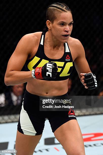 Amanda Nunes of Brazil looks to strike Valentina Schevchenko in their women's bantamweight bout during the UFC 196 event inside the MGM Grand Garden...