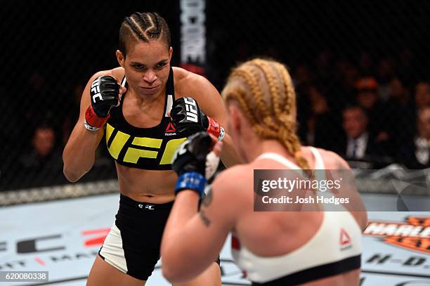 Amanda Nunes of Brazil looks to strike Valentina Schevchenko in their women's bantamweight bout during the UFC 196 event inside the MGM Grand Garden...