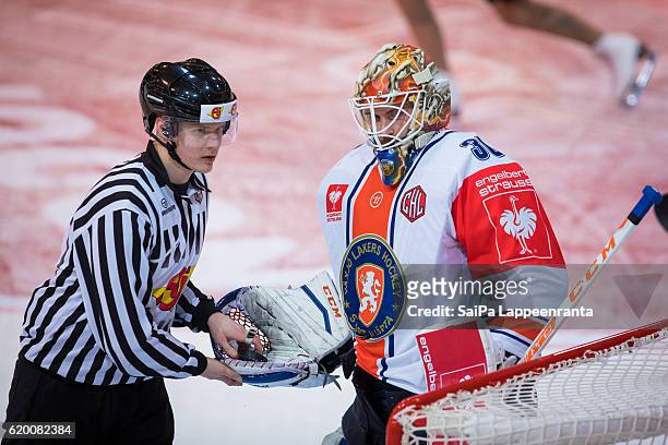 Referee Masi Puolakka and Joachim Eriksson of Vaxjo during the Champions Hockey League Round of 16 match between SaiPa Lappeenranta and Vaxjo Lakers...