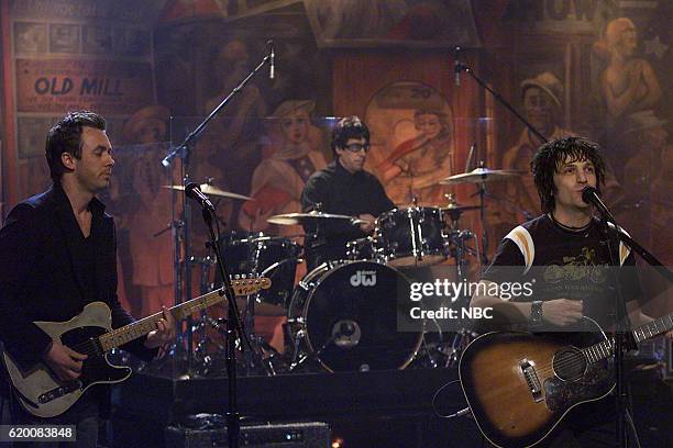 Episode 2446 -- Pictured: Musical guest Jesse Malin performs with band on March 7, 2003 --