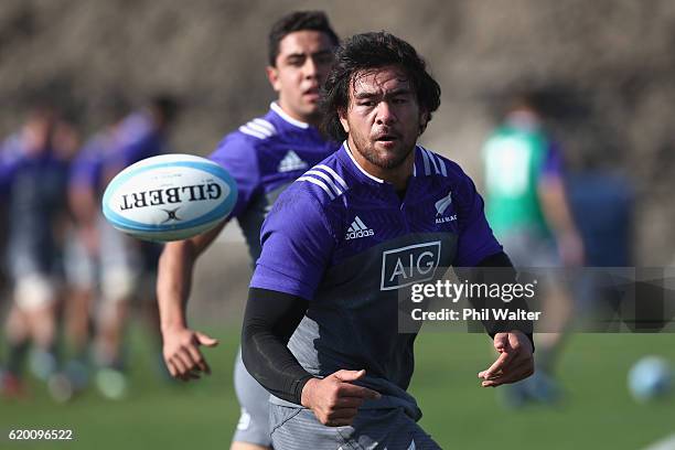 Steven Luatua of the New Zealand All Blacks passes the ball during a training session at Toyota Park on November 1, 2016 in Chicago, Illinois.