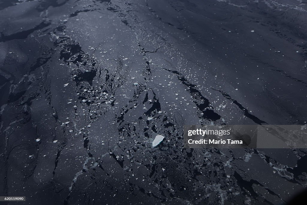 Ice floats in West Antarctica as seen from a window of a NASA... News ...