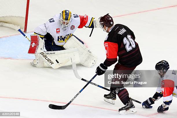 Petr Vrana of HC Sparta Prague shoots on Fredrik Pettersson Wentzel of Jonkoping during the Champions Hockey League Round of 16 match between Sparta...