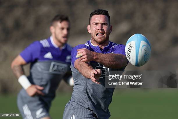 Ryan Crotty of the All Blacks passes during a training session at Toyota Park on November 1, 2016 in Chicago, Illinois.