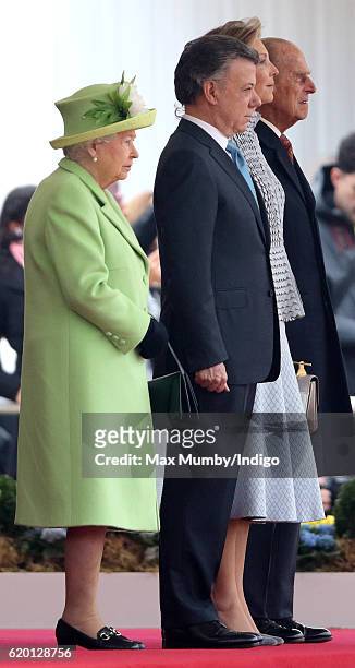 Queen Elizabeth II, Colombian President Juan Manuel Santos, Maria Clemencia Rodriguez de Santos and Prince Philip, Duke of Edinburgh attend the...