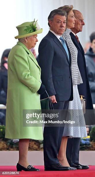 Queen Elizabeth II, Colombian President Juan Manuel Santos, Maria Clemencia Rodriguez de Santos and Prince Philip, Duke of Edinburgh attend the...