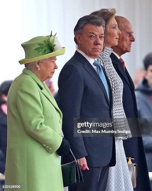 Queen Elizabeth II, Colombian President Juan Manuel Santos, Maria Clemencia Rodriguez de Santos and Prince Philip, Duke of Edinburgh attend the...