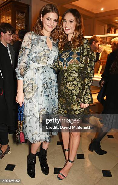 Amber Anderson and Lily James, wearing Burberry, attend an event to celebrate 'The Tale of Thomas Burberry' at Burberry's all day cafe Thomas's on...