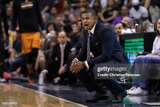 Head coach Earl Watson of the Phoenix Suns reacts during the second half of the NBA game against the Golden State Warriors at Talking Stick Resort...