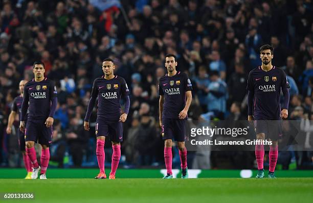 Luis Suarez of Barcelona, Neymar of Barcelona, Sergio Busquets of Barcelona and Andre Gomes of Barcelona are dejected after Kevin De Bruyne of...