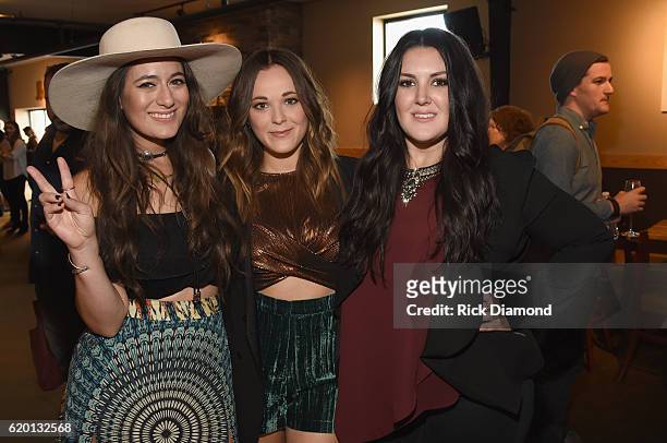 Alyssa Bonagura, Jillian Jacqueline and Kree Harrison take photos before CMT's Next Women of Country on November 1, 2016 in Nashville, Tennessee.