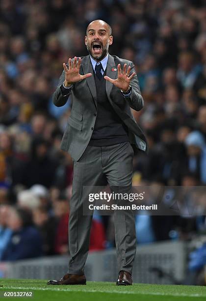 Josep Guardiola manager of Manchester City reacts during the UEFA Champions League Group C match between Manchester City FC and FC Barcelona at...