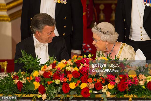 Queen Elizabeth II and Colombia's president Juan Manuel Santos attend a State Banquet at Buckingham Palace on November 1 in London, England. The...
