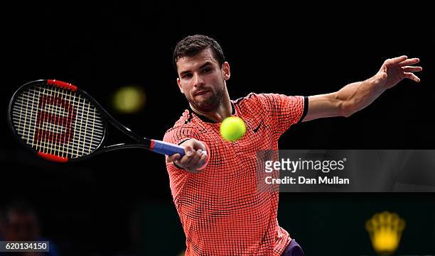 Grigor Dimitrov of Bulgaria plays a forehand against MArcos Baghdatis of Cyprus during the Mens Singles second round match on day two of the BNP...