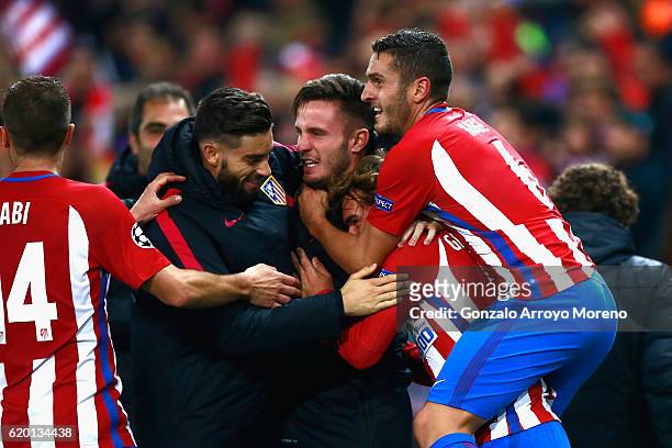 Antoine Griezmann of Atletico Madrid celebrates scoring his sides second goal with his Atletico Madrid team mates during the UEFA Champions League...